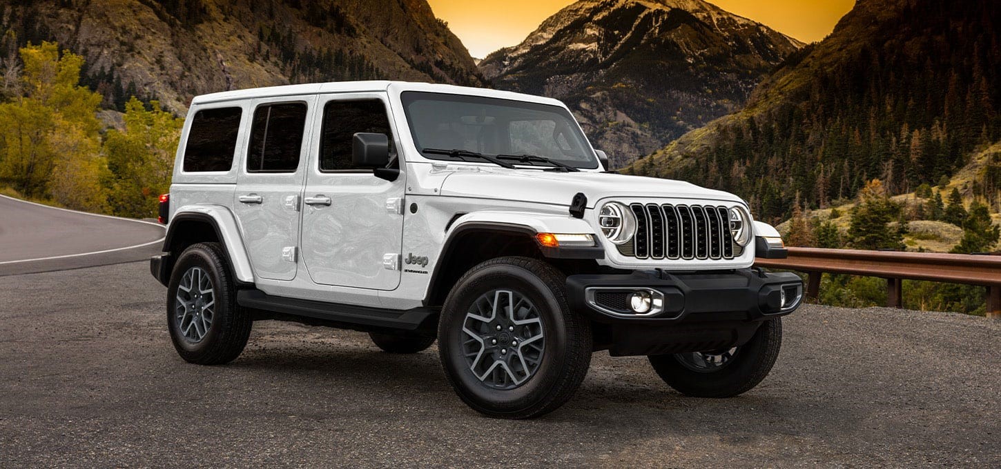 Jeep Wrangler climbing rocks with Rock-Trac 4x4 system